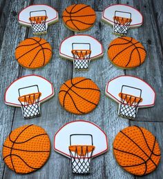 basketball cookies decorated with royal icing are arranged in the shape of basketball hoops