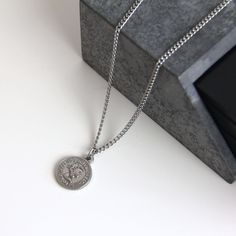 This stainless steel coin pendant necklace is an excellent choice for a trendy yet sophisticated look that won't tarnish or rust, even when worn in the water. 💎Free shipping on all orders💎Waterproof and non-tarnish💎Packaging that is ready to offer as a gift💎Customizable and adjustable chain length A coin pendant necklace, a great gift idea for yourself of for others This bestselling pendant necklace is a unique gift for the important people in your life, guaranteed to bring joy to the recipi Silver Charm Necklace With Coin And Adjustable Chain, Silver Charm Necklace With Adjustable Coin Chain, Round Metal Medallion Necklace, Tarnish Resistant, Round Metal Medallion Necklace Tarnish Resistant, Silver Tarnish-resistant Medallion Necklace, Stainless Steel Medallion Necklace Tarnish Resistant, Stainless Steel Tarnish Resistant Medallion Necklace, Silver Minimalist Medallion Necklace With Adjustable Chain, Minimalist Silver Medallion Necklace With Adjustable Chain