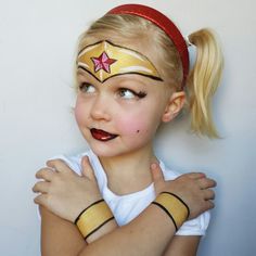 Wonderwoman done by fanciful facepainting look it up on facebook Super Hero Face Paint Easy, Wonder Woman Face Paint, Superhero Face Painting Easy, Wonder Woman Makeup Tutorial, Superman Face Painting, Face Painting Wonder Woman, Simple Superhero Face Paint, Carnaval Make-up