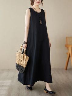 Effortless Simplicity - Sleeveless Round-Neck Midi Dresses with Loose Fit in Solid Color Understated Elegance, Midi Dress Sleeveless, Elevate Your Style, Midi Dresses, Fit In, Color Palette, Round Neck, Loose Fitting, Midi Dress