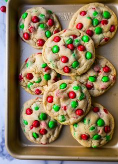 chocolate chip cookies with m & m candies and green and red sprinkles