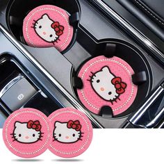 three hello kitty cupcake tins in the oven