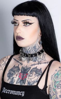 Flutter your way to punk perfection with our Butterfly Spike Choker! This gothic necklace gives your style a hint of badass with silver rings, butterfly charms, and punk spikes hanging from a vegan leather choker. Adjustable buckle up closure. Measures 45.2cm. Heavy Metal Makeup, Spike Jewelry, Metal Makeup, Occult Clothing, Gothic Chokers, Alternative Jewelry, Crescent Moon Pendant, Witchy Jewelry, Gothic Necklace