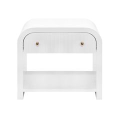 the side table is white and has two drawers on each side, with gold handles