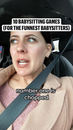 a woman sitting in the back seat of a car with a surprised look on her face