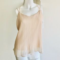 New With Tag Color: Ivory Size:S Material Of Chiffon Does Not Stretch. Please Refer To The Size. Chic Sleeveless Sheer Top, Elegant Sheer Sleeveless Tank Top, Chic Sheer Camisole For Spring, Feminine Sheer Sleeveless Camisole, Elegant Beige Tank Top For Spring, Spring Chiffon Sleeveless Blouse, Feminine Cream Tank Top For Spring, Chic Beige Tank Top For Spring, Sheer Sleeveless Blouse