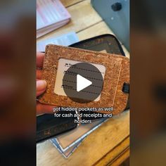 someone is holding a cork wallet with the text, got hidden pockets as well for cash and receipts and folders