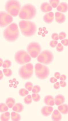 an abstract pink and white background with small circles in the shape of flowers on top of each other