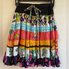 Lapogee Ruffle Skirt Women Size S Colorful Elastic On The Waist Material 100% Cotton Measurements Waist 12” Length 19” Multicolor Patchwork Midi Skirt, Casual Multicolor Cotton Skirt, Casual Tiered Skirt With Patchwork, Casual Tiered Patchwork Skirt, Casual Multicolor Mini Skirt With Elastic Waistband, Casual Multicolor Relaxed Skirt, Multicolor Tiered Skirt For Vacation, Multicolor Patchwork Summer Skirt, Multicolor Tiered Vacation Skirt