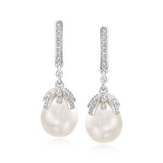 Ross-Simons - 9-9.5mm Cultured Pearl, .12ct t.w. Diamond Drop Earrings in Silver. Luminous 9-9.5mm cultured freshwater pearls are capped with sparkly .12 ct. t.w. diamonds. These dangly beauties transition perfectly from day to night! Crafted in polished sterling silver. Hanging length is 1". Post/clutch, diamond and white pearl drop earrings. Pearl birthstones are the perfect gift for June birthdays. Diamond Pearl Drop Earrings, Pearl Cuff Bracelet, Pearl Birthstone, Freshwater Pearl Drop Earrings, Pearl And Diamond Earrings, Pearl Types, Diamond Drop Earrings, Freshwater Cultured Pearls, Diamond Drops