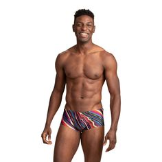 New! Mr. Turk South Beach Swim Trunk Ideal for your next vacation, this easy swim trunk features a colorful print, comfortable inner drawstring closure, and a fitted silhouette. A fierce new addition to your swim wardrobe, this men's swim short is ready for any adventure. Inner, adjustable drawstring Fitted Underseam: 3.75", Front rise: 8" Electric Reef Swim Print 83% Nylon, 17% Lycra Hand wash cold. Fabric from Portugal. Swim Short, Mens Swim Shorts, Swim Sets, Beach Swim, Swim Brief, Womens Jersey, Muscular Men, Clothing Essentials, Designer Clothes For Men