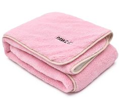 two pink towels folded on top of each other with the word towel written on it