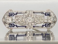 Antique Platinum Diamond Brooch with Enamel – Seng Jewelers Silver Elegant Enamel Pin For Formal Use, Silver Elegant Enamel Pin For Formal Events, Elegant Silver Enamel Pin For Formal Occasions, White Art Deco Brooches For Formal Occasions, Edwardian Jewelry, Diamond Brooch, Amethyst Jewelry, Marquise Cut, Antique Jewelry