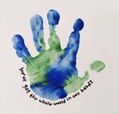 a hand print with words on it that says, keep the whole world in my hands