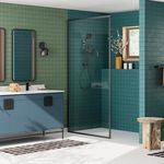 a bathroom with blue and green walls, white flooring and two sinks in it