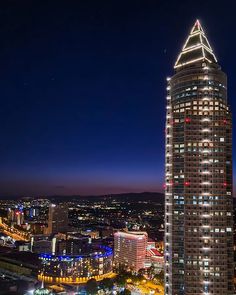 an aerial view of a city at night