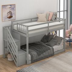 a bunk bed with stairs is shown in the corner next to a couch and chair