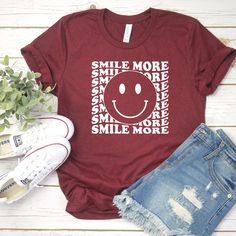 Smile Often Shirt - Smile Tee- Cute Smile Shirt- Retro Smile tee- Smile Often shirts- Retro Smile Shirts - Retro Hippie - Trending for Teen SMILE OFTEN RETRO SHIRT ** Please add the saying you would like to each shirt - include to add on the back . If you have any questions, feel free to ask. Adult Unisex Triblend short sleeved Crew Neck. 50% Poly 25% Combed Ring-Spun Cotton 25% Rayon This shirt is Unisex so for a female, it is a looser fitting shirt. I always get asked about sizing... here is t Short Sleeve Shirt With Funny Print For Everyday, Everyday Funny Print Crew Neck Shirt, Everyday Crew Neck Shirt With Funny Print, Short Sleeve Tops With Funny Text, Funny Text Short Sleeve Tops, Funny Print Crew Neck Top For Everyday, Funny Text Crew Neck Tops For Everyday, Everyday Crew Neck Top With Funny Text, Smiley Shirt