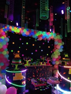 an image of a party with balloons and lights