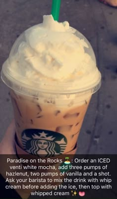 someone is holding up a starbucks drink with whipped cream on top and the caption reads, paradise on the rocks order an iced