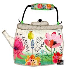 a tea pot with flowers painted on it