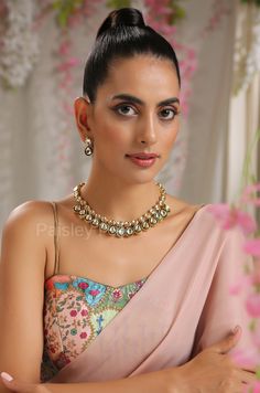 The green Kundan necklace set is inspired by the rich Indian jewelry-making techniques handcrafted by the artisans to bejewel your neckline and create magic with every outfit. The Indian Kundan necklace is inspired by the woman of today who loves beauty with heritage. Pair this gorgeous replica of Bollywood jewelry with your ethnic or contemporary ensembles and create a look to remember. Necklace Closure - Adjustable Dori Earrings Closure - Push Back Style Tip - The tasteful design with oodles o Green Kundan Necklace, Sabyasachi Jewelry, Necklace Closure, Sabyasachi Jewellery, Kundan Necklace Set, Necklace Set Indian, Kundan Jewelry, Pearl Necklace Set, Earrings Indian