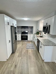 the kitchen is clean and ready for us to use in its new owner's home