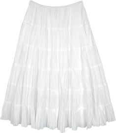 A bright milky white tiered midi skirt in cotton that keeps you comfy and cool this season.  This charming white skirt has 6 panels and quite some flare. #tlb #Crinkle #TieredSkirt #FairycoreSkirt #TieredSkirt #PixieSkirt White Ruffled Flared Maxi Skirt, White Voluminous Tiered Maxi Skirt, White Tiered Gathered Maxi Skirt, White Ruffled Full Maxi Skirt, White Cotton Gathered Maxi Skirt, White Cotton Maxi Skirt With Gathered Detail, Flowy Tiered White Skirt, White Cotton Pleated Maxi Skirt, White Relaxed Fit Tiered Maxi Skirt