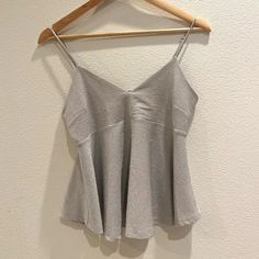 Wild Fable Sparkly Tank Top Size Small Never Worn Super Cute!!!!! Chic Silver V-neck Top, Metallic V-neck Top For Summer, Gray Summer Party Top, Gray Summer Party Tops, Summer Party Gray Top, Silver Stretch Tank Top For Summer, Silver Stretch Top For Spring, Silver Stretch Tops For Spring, Chic Silver Tank Top For Summer