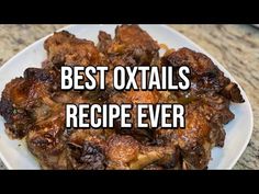 the best oxtails recipe ever on a white plate with words overlaying it