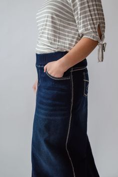 Every modest wardrobe deserves a maxi denim skirt and we're excited to offer the Arabella in sizes XS-5XL so all women have options! Crafted of soft and stretchy denim fabric, this skirt features a non-bulky elastic waist, four functional pockets, only light vintage fading and top-stitching details on back pockets and seams. Style this maxi denim with a range of tops or sweaters and wear for everything from a brisk morning walk to frosting cupcakes for a bake sale. ﻿Fit: We recommend sizing up o Frosting Cupcakes, Maxi Denim Skirt, Modest Wardrobe, Be Intentional, Morning Walk, Stitching Details, Denim Maxi Skirt, Garment Labels, Bake Sale