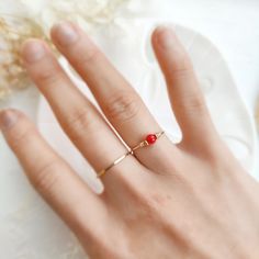 ❤ Tiny Red Coral Ring ❤14K Gold Filled, Rose Gold Filled, Sterling Silver Wire Wrapped Red Coral Ring, Pinky Ring❤ Red coral is the best stone to wear for vitality, energy & ambition. Its bright red color symbolizes blood and planet Mars which can be very powerful & energizing. It is believed to be effective in both prosperity & romantic love ❤ Sizing:• Gemstone Size: 4 mm• Ring Band: 0.8 mm• Handmade in your ring size with a natural gemstone bead and your choice of 14k gold-filled, rose gold-fi Red Birthstone Promise Ring With Round Band, Red Birthstone Promise Ring Fine Jewelry, Red Ruby Ring For Promise With Round Band, Red 14k Gold Birthstone Ring For Promise, Red Ruby Promise Ring With Round Band, Adjustable Red Birthstone Promise Ring, Dainty Red Promise Ring, Red Promise Rings With Birthstone, Red Round Band Promise Jewelry