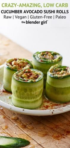 four cucumber - avocado sushi rolls on a plate