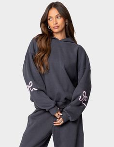 Reach Your Ultimate Level Of Coziness, While Still Feeling On-Trend With This Perfect Oversized Sweatshirt. Pair It With Its Matching Sweatpants To Complete The Look. Hoodie. Graphic Bow Detailing. Matching Set. 50% Cotton, 50% Polyester. Model Wears Size S. Model Height Is 5'9. Item Care: Machine Wash At Maximum 30ºc, Do Not Bleach, Do Not Tumble Dry, Iron At A Maximum Of 110ºc, Do Not Dry Clean. | Edikted Bonney Bow Detail Hoodie Sweatpants And Hoodie, Hoodie Graphic, Hoodie And Sweatpants, Sweatpants Set, Women Hoodies Sweatshirts, Oversized Sweatshirt, Oversize Hoodie, Everyday Wardrobe, Outfit Set