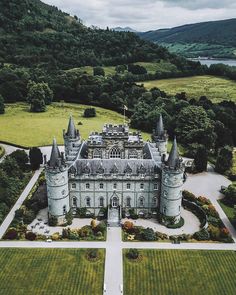 an aerial view of a castle in the countryside