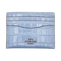 The Coach Women's Small Slim Leather ID Card Case is crafted from croc-embossed leather, offering a stylish and functional design. It features an ID window, 3 credit card slots, and an open middle compartment for quick access to your essentials. With its slim profile, this card case is perfect for slipping into any bag or pocket for everyday use. Color: Blue.  Gender: female.  Age Group: adult. Formal Coach Card Holder, Elegant Rectangular Crocodile Pattern Card Holder, Elegant Crocodile Pattern Card Holder, Luxury Coach Card Holder With Card Slots, Elegant Coach Card Holder With Card Slots, Blue Coach Wallets With Card Slots, Elegant Coach Leather Card Holder, Blue Leather Coach Wallet, Cornflower Blue