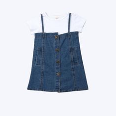 Are you looking for a dress for your toddler or a gift for your friend? Get your little one ready with our cute denim dress. This denim dress is made of good quality cotton and denim material. The material is gentle and comfortable on your girl's skin. It is great for everyday wear. It is comfortable, convenient, and easy to care for and does not show stains adversely. Material: Cotton 1 x Top & 1 x Skirt Denim Material, Dress Set, Denim Vest, A Dress, Overall Shorts, Set Dress, Denim Dress, Good Quality, Overalls