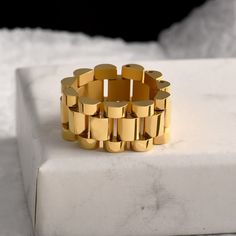 Timeless with a twist. The Watch Link Ring Band is a classic watch band link design in the form of a chunky ring. It's the perfect boss babe accessories with the perfect amount of edge. Add this to your stack for the perfect layered look. DETAILS & SIZE Composition: 18K gold or silver plated over 316L Stainless Steel Measurements: Width: 10mm; US Ring sizes: 6, 7, 8, 9 Learn how to find your ring size here. Read about how to care for our jewelry here. Shop Rings for more options! Complete the Lo Link Ring, Link Design, Chunky Ring, Stylish Rings, Trendy Ring, Linking Rings, Chunky Rings, Classic Watches, Ring Sizes