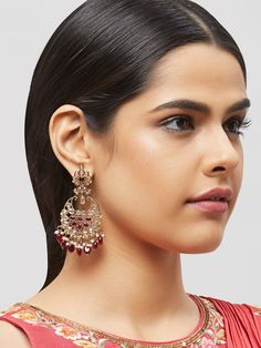 NAZRANAA JEWELS OFFERS A GREAT RANGE OF INDIAN JEWELRY FOR TODAY'S WOMAN WITH THE LATEST DESIGNS. THE BRAND IS COMMITTED TO PROVIDING ITS CUSTOMERS WITH THE HIGHEST QUALITY OF GOODS AND NEWEST DESIGNS. IT IS SUITED FOR A WOMAN WHO IS LOOKING TO STAY DATED WITH THE LATEST TRENDS. RADIANT ANTIQUE GOLD EARRINGS IN DIFFERENT COLOR PEARLS IS A PERFECT ACCESSORY FOR ANY NIGHT EVENT. IT IS SURE TO MAKE YOU STAND OUT IN A CROWDED ROOM. Traditional Indian Jewelry: Slight Color variations possible due to Yellow Gold Chandbali Earrings For Wedding, Gold Chandbalis For Anniversary, Festive Single Yellow Gold Earring, Temple Jewelry Wedding Earrings For Pierced Ears, Jeweled Drop Earrings For Celebrations, Yellow Gold Pierced Danglers For Wedding, Festive Gold Jeweled Chandelier Earrings, Festive Drop Earrings For Anniversary, Festive Drop Earrings For Anniversaries