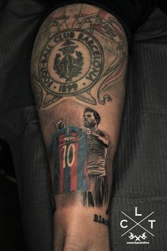 a man with a tattoo on his arm and foot that has the number 10 on it