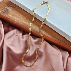 Introducing our all-new Luxe Gold Delicate Herringbone Chain – your stylish sidekick for every occasion! Whether you're rocking your favorite jeans and tee combo or glamming up for a night out, this chain has got your back. Versatility is the name of the game here. Whether you're a fan of minimalism or love a layered look, this necklace is your ultimate styling canvas. * 18k gold-plated stainless steel * Hypoallergenic * Tarnish resistant * Waterproof PVD Coating * Durability * Longer lifetime * Curvy Girl Dress, Pvd Coating, Herringbone Chain, Got Your Back, Graphic Tops, Layered Look, Your Back, Men's Collection, Love A