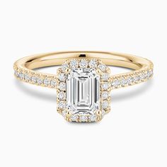 an emerald cut diamond engagement ring set in rose gold