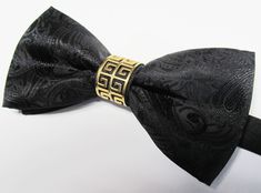 "Beautiful pre-tied and adjustable double tiered banded bow tie. Will adjust from 13\" through 20\" neck. Bow dimensions 2.5\" x 4.5\". Bow tie comes complete with matching free pocket square.  Always made by hand and to your special order. Weddings and groups are welcome." Adjustable Gold Bow Tie For Black Tie Events, Butterfly Knot Bow For Black-tie Events, Adjustable Pre-tied Decorative Bow, Elegant Pre-tied Bow For Gift, Formal Adjustable Bow Tie With Butterfly Knot, Adjustable Pre-tied Bow Tie For Black Tie Occasion, Adjustable Pre-tied Bow Tie For Black Tie Events, Adjustable Butterfly Knot Bow Tie For Black Tie Events, Adjustable Decorative Bow For Black-tie Events