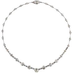 An Art Deco white gold necklace set with 32 graduating old cut diamonds (app. 10 carats in total), circa 1920, French. diameter diamonds: 2.6 – 7.4 mm weight necklace: 19.87 grams length: 38.5 cm Luxury White Gold Art Deco Necklace, Riviere Necklace, Bamboo Necklace, Black Gold Necklace, Cartier Gold, Necklace Art Deco, Cuban Link Necklace, Necklace Art, White Gold Necklace