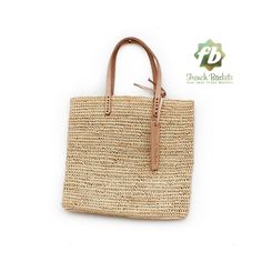 "🧺 Medium Tote bag made of Raffia Natural Yarn straw Natural color 🧺 Our Baskets are classic French Market Basket. The perfect choice for shopping trips, picnics, days at the beach. Not only, they're eco-friendly, they look great in the home for storing toys or magazines. Handwoven by women in Morocco using palm leaf, and crafted in our workshop, they are both sturdy and flexible. With short leather handles for comfortable carrying. APPROX SIZE : ⚬ SIZE Basket: H26cm x L27cm / H10 in x L10,5 i French Market Basket, French Baskets, Straw Purse, Medium Tote Bag, Handmade Crochet Bags, Summer Tote Bags, Market Basket, Wicker Bags, Raffia Bag