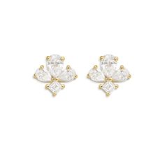 pair of gold and white cubicge earrings with small stones on each side, set in 18k yellow gold