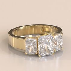 🖊️ Ring Size - 4 to 12 🖊️ Metal - 14K/18k Solid Rose gold/ Yellow Gold/ White Gold/Silver 🖊️ Ring weight - 5g (Approx.) (vary on ring size) 🖊️ Gem Type - Moissanite or Lab-Grown Diamond 🖊️ Total Stone pieces - 1 (9x7mm), 2 (7x5mm) 🖊️ Stone Color - White (Colorless) 🖊️ Hallmark 𝐃𝐢𝐚𝐦𝐨𝐧𝐝 𝐃𝐞𝐭𝐚𝐢𝐥𝐬:- 💎EF, VVS, Excellent Cut, 4.5CT Total Weight Our jewelry is always made of solid gold or platinum using Lab-grown diamonds and moissanite. All of our diamonds are Handmade and polishe Gia Certified Gold Diamond Promise Ring, Gia Certified Gold Promise Ring, Gia Certified Gold Princess Cut Diamond Ring, Gold Radiant Cut Diamond Ring With Center Stone, Anniversary Yellow Gold Radiant Cut Wedding Ring, Anniversary Yellow Gold Radiant Cut Ring, Gold Radiant Cut Diamond Ring For Anniversary, Gold Three-stone Radiant Cut Jewelry, Gold Diamond Ring For Anniversary With Radiant Cut