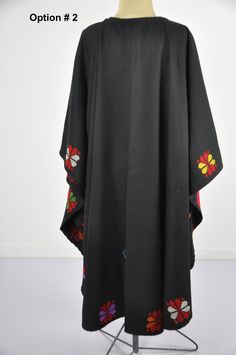 This vintage cape jacket is definitely a vintage fashion statement. It is 100% hand embroidered with geometrical patterns. It can be used over a jeans and shirt or sweater. Great to keep you warm. Please note that the capes we have at the moment (Option #1 and Option #2) are without a hoodie but they are just as beautiful and practical. Material : Wool Length : 49 inches Size : One size fits all. We ship your order with DHL express within one to two business days. Orders to Europe will typically Traditional Black Cape For Fall, Embroidered Cape Outerwear For Fall, Traditional Black Shawl Outerwear, Bohemian Wool Cape Outerwear, One Size Wool Cape, Jeans And Shirt, Wool Cloak, Hooded Shawl, Winter Cloak