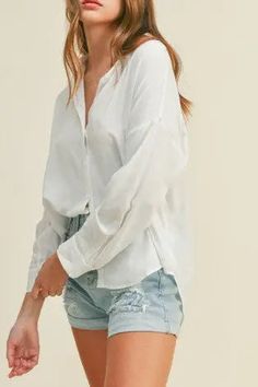 The Tiny Details Relaxed White Long Sleeve Button Shirt Classic Closet, White Knit Top, Beachy Vibes, Acid Wash Denim, High Waisted Jean Shorts, White Button Up, Mini Short, It's Hot, Tunic Shirt