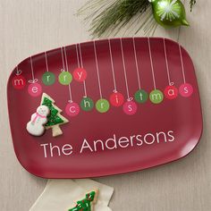 the personalized plate is decorated with christmas decorations